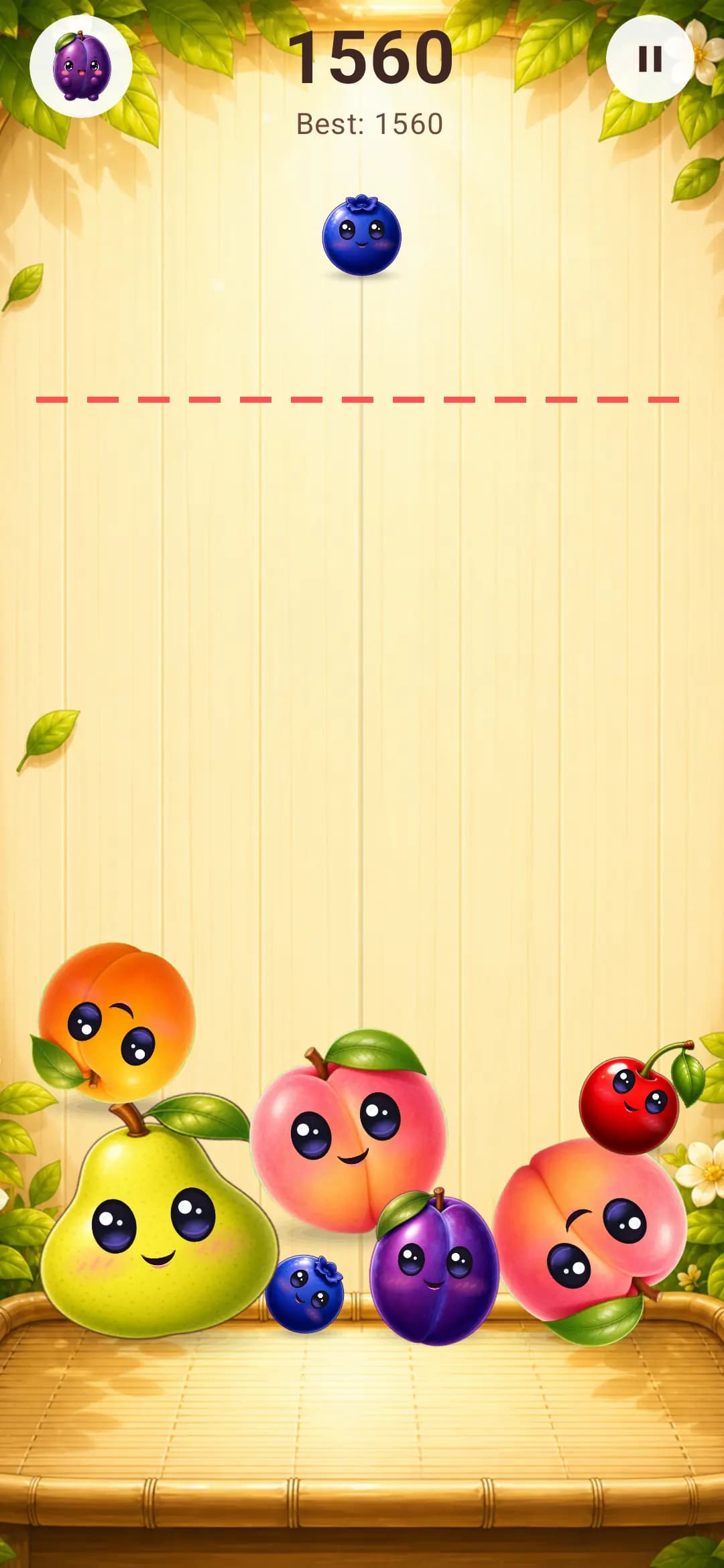 Fruit Fall gameplay screen with falling fruit